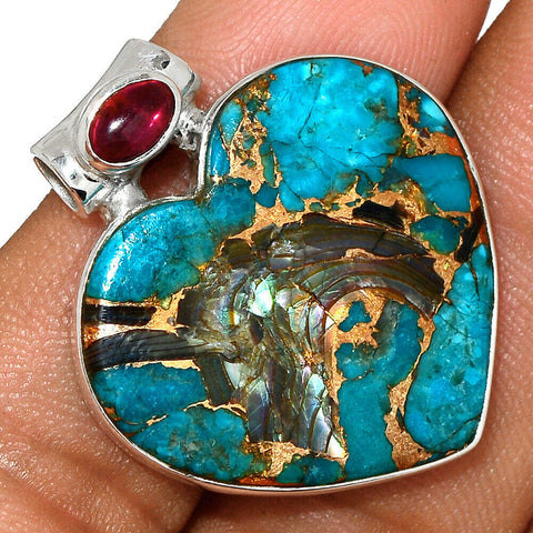 Blue copper turquoise pendant with garnet accent  set in solid sterling  silver with chain