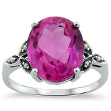 “Mine” Breathtaking 7 carat pink sapphire, (lab) set in solid Sterling silver with tiny seed pearl accents.