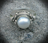 Ornate sterling silver button pearl ring.